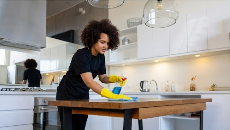 Luxcare cleaner detailing a kitchen counter